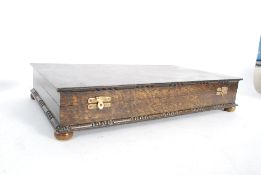 A good quality 20th century canteen of cutlery complete in the wooden presentation case being baize