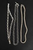 A collection of three white metal silver (marked 925) ladies necklaces. 78.5g.