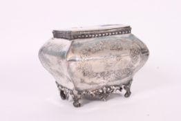 A Victorian silver plated caddy of bulbous form having chase decorated body over rococo style base