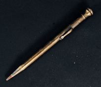 A mid 20th century Sterling silver marked propelling pencil together with a new and unusued stamp