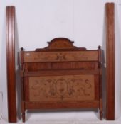 A late 19th cenutry Pitch Pine Art Nouveau 3/4 bed having marquetry inlaid details.