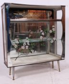 A 1950's retro mirror glass and formica china / ornament display cabinet.