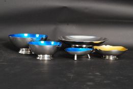 A collection of silver plated enamel wares x 4 along with a silver dish tazza all by Carl
