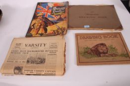 A collection of sketch books from during WWII having sketches of British and German planes,