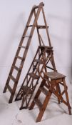 A collection of 3 mid 20th century Industrial wooden ladders to include trestle sides small step