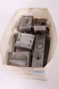 A collection of unusual fishing weight moulds together with some vintage large sea fishing hook /