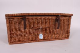 A vintage 1970's picnic hamper complete with flatware and tupperware inside