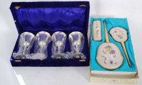 A mixed lot to include a boxed dressing table set,