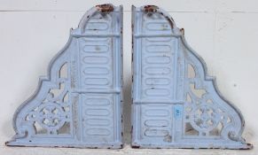 2 19th century large architectural salvage cast iron wall brackets.