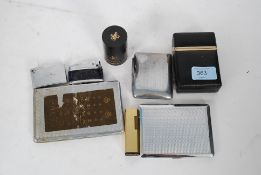 A collection of smoking related items to include lighters, matches,