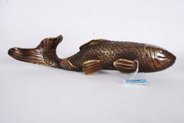 A 20th century brass metal study of a Coy Carp fish, with cast detail by way of scales and fins.