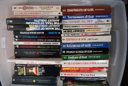 A collection of mostly soft covers inclu