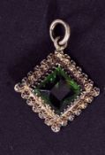 A Charles Horner silver and emerald garn