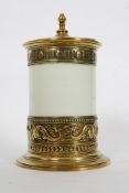 A 19th century brass and ceramic tobacco