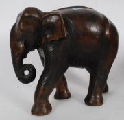 A large heavy 20th century carved wood e