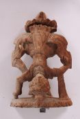 A Balinese carved hardwood wall bracket