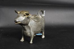 A 20th century cast metal bull lidded po