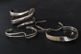 A collection of 3 ladies silver bangles