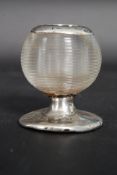 An Art Deco glass and hallmarked silver