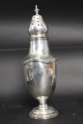 A large silver hallmarked sugar sifter,