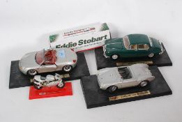 A collection of 1:18 scale diecast model
