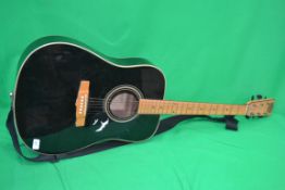 A Tanglewood six string accoustic guitar