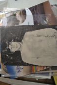 A Mick Jagger magazine cut out photograph, with signature.