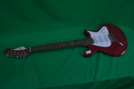 A large jet - gibson style red electric