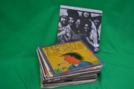 A collection of vinyl records to include