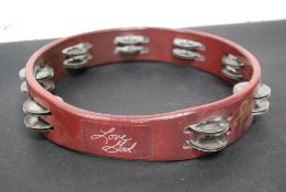 PRINCE; An original 1980's on-stage used tambourine by Prince.