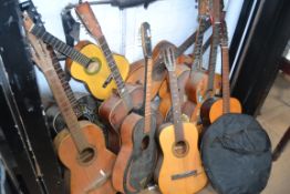 A collection of 10 assorted acoustic gui