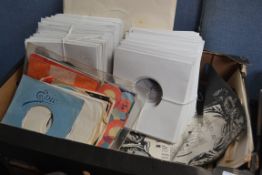 A collection of cardboard 45rpm sleeves