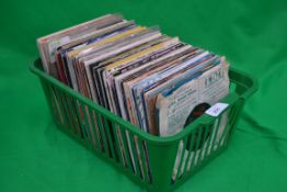 A collection of vinyl 45's to include 19