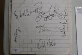A Pink Floyd - The Wall album having 13 signatures ( see illustration )
.