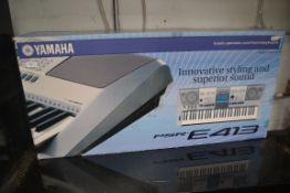 A boxed Yamaha keyboard player model NO