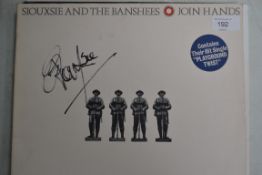 A Siouxsie and the Banshies  - Join Hands album, with signatures.