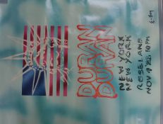 An original Duran Duran New York tour poster being signed to the corner EBoy


Please note;