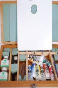 An artists paint box by Windsor & Newton comprising oils,