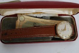 A Baume 9ct gold Bimatic 17 Jewel wristwatch having gilded facia with subsiduary seconds dial set