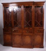 An excellent burr walnut regency style breakfront library bookcase cabinet.