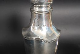 A large silver hallmarked sugar sifter, possible by Henry Matthews, Birmingham 1928. Weight 168.