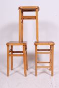 A collection of 3 retro vintage 20th century wooden stools having panel set tops ( see illustration