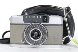 A vintage 20th century retro Olympus SLR PEN Camera with case