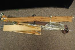 A good collection of vintage fishing rods to include split cane and others,