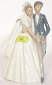 NAO; A Nao figurine ' Unforgettable Dance ' wedding figurine of a bride and groom.