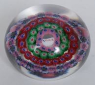 A Baccarat millefiori concentric paperweight.