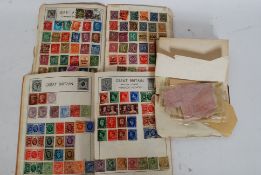 A collection of 3x vintage stamp albums to contain both GB stamps and overseas.