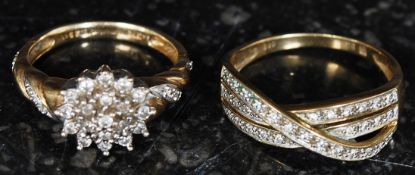 Two 9ct yellow gold and diamond ladies rings.
