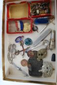 A good mixed lot to include assorted military badges, enamel badges, Coronation medal,