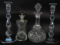 A good pair of large cut glass candlesticks dating to the 20th century together with a good cut